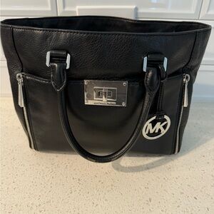 Michael Kors black tote with silver hardware. Great condition